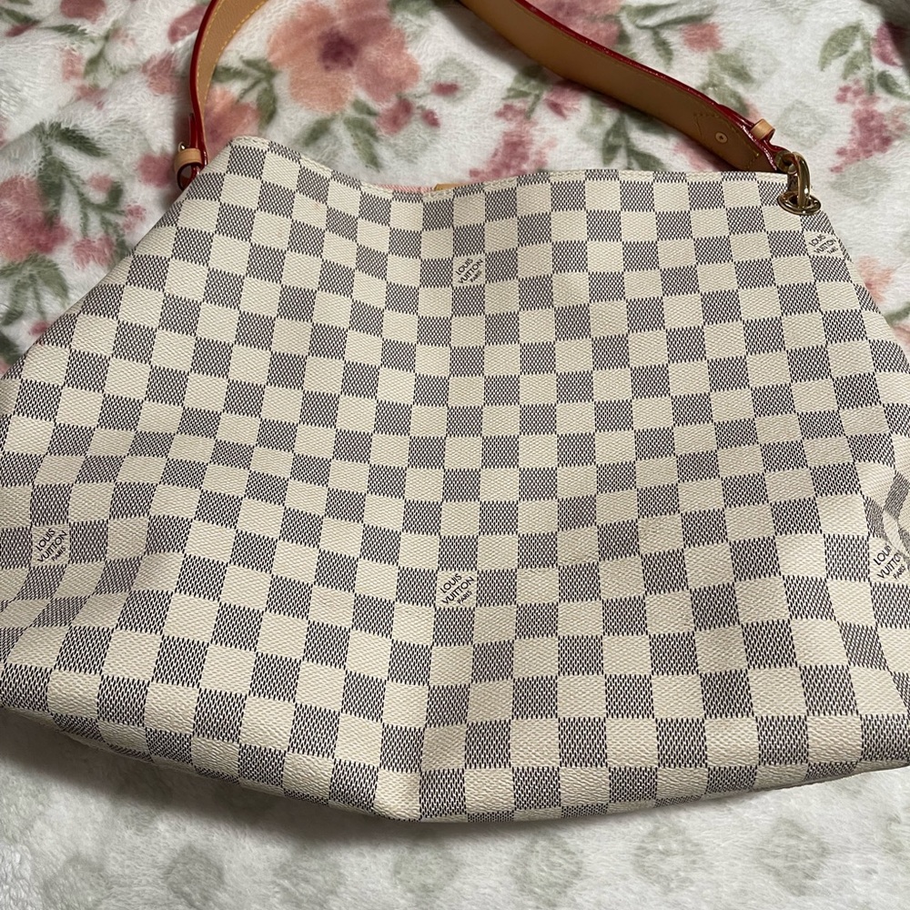 Checkered bag and matching wallet. Pink inside